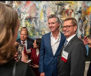 Kai Westerwell, chair of German Business Association, with Governor Newsom.