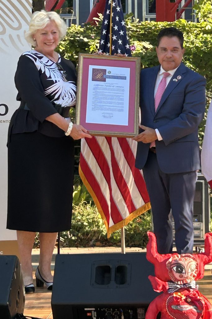 Susanne Stirling accepts Senate Resolution from Senator Steve Padilla